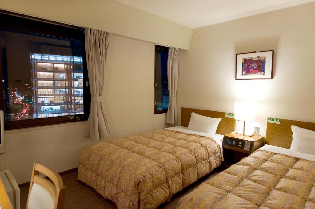 Hotel Keifuku Fukui Ekimae Zimmer foto